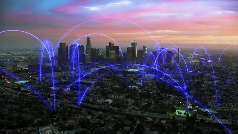 Blue holographic lines connecting Los Angeles. Smart and futuristic metropolis at dusk. Arch network animation. Shot in 8K. Famous skyscrapers in downtown.