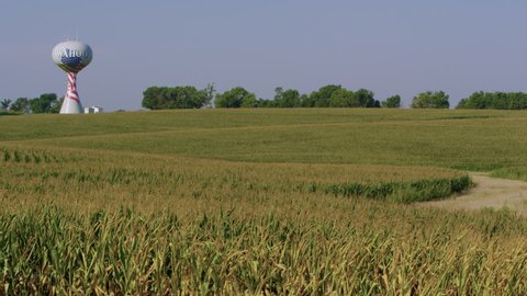 Shot of a water tank amidst crop fields in Wahoo, Nebraska.