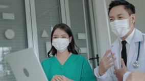  team of Asian doctors are consulting patients online.
