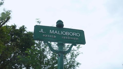 Yogyakarta, Indonesia - March 17, 2021: The iconic Malioboro street sign in the center of Yogyakarta