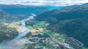 Time lapse video of the Lom city in the beautiful valley in Jotunheimen national park in Norway during summer afternoon.
