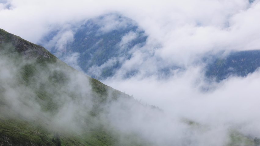 Deep clouds over Grossglockner High Alpine Road in Austria - travel photography