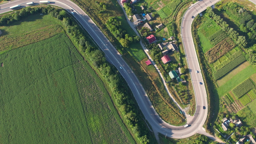 Curved Road Aerial View. Epic Hill Highway Go Through Eastern Europe Ecosystem.