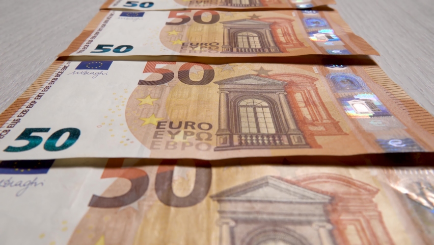 Manual counting of euro banknotes.Cash 50 euro bills.Accounting for fifty euro banknotes.Cash background in euros.European banknotes are a tangential policy.Wealth or debts in foreign currency.Money Royalty-Free Stock Footage #1078126613