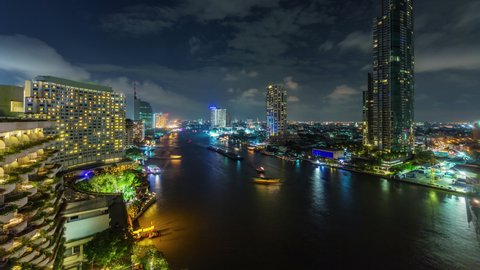 night time illumination bangkok city famous traffic river luxury hotel bay rooftop panorama 4k timelapse thailand