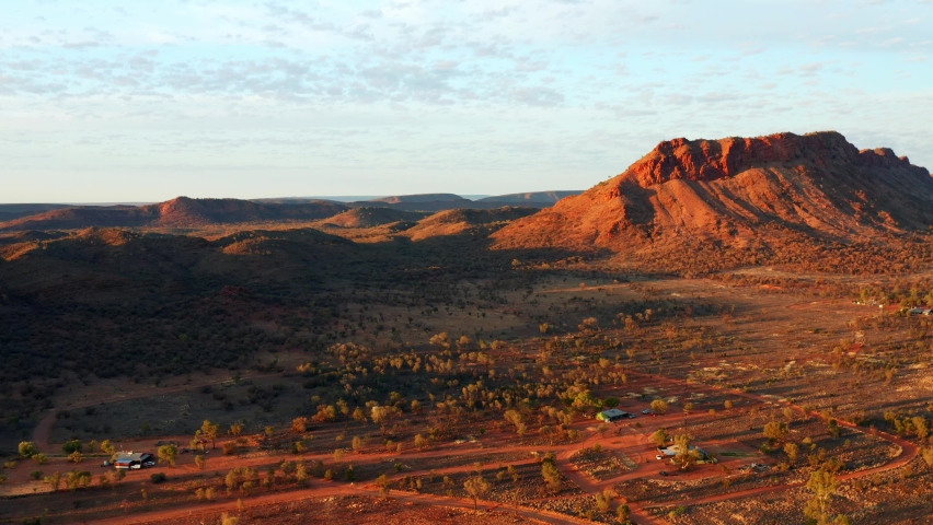 Distant View Of West MacDonnell Ranges On The Wilderness Of Alice Springs, Northern Territory, Australia. aerial