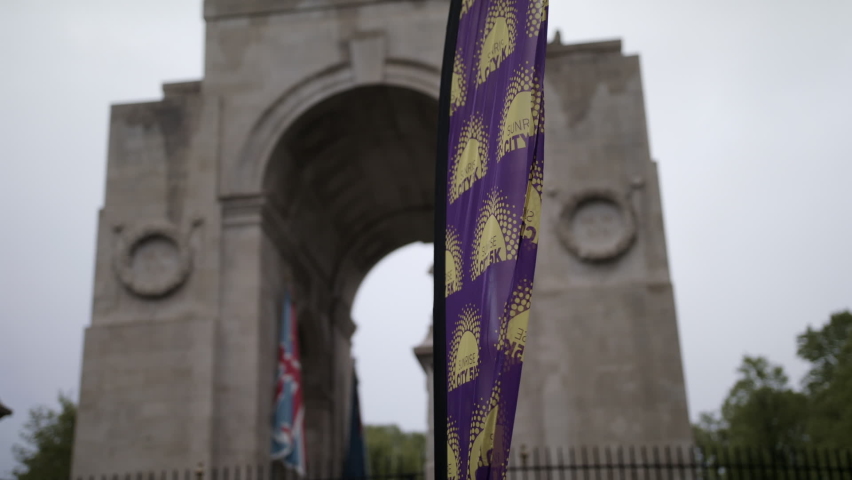 LEICESTER, LEICESTERSHIRE, ENGLAND, UK: - APRIL 13, 2019: Arch of Remembrance and a purple flag