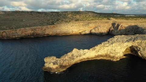 Aerial video of Pont den Gil at sunset. Minorca.