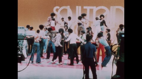 1970s: People dance on Soul Train.
