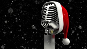Animation of santa hat on retro microphone over snow falling and stars. christmas, tradition and celebration concept digitally generated video. - Powered by Shutterstock - Get 15% off with code: PIKWIZARD15