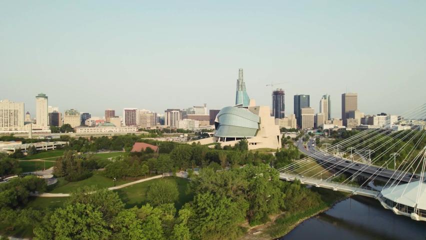Winnipeg, Canada. Aerial shot of downtown skyline and Red River Royalty-Free Stock Footage #1078164650