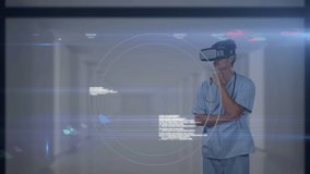 Animation of data processing over female doctor wearing vr headset. global science, medicine, data processing and digital interface concept digitally generated video. - Powered by Shutterstock - Get 15% off with code: PIKWIZARD15