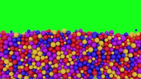 Piles of gumballs fill the green screen with colorful rolling balls that go up. Multicolored plastic spheres in children's pool fun abstract transition. Vertical change. 3D animation for overlay