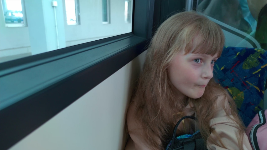 Girl sitting on the bus camera movement