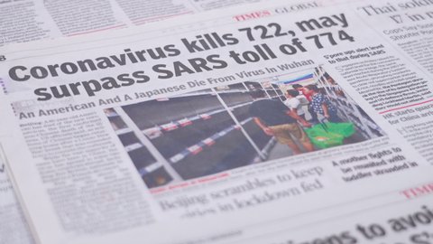  Dehradun, Uttarakhand India June 28, 2021. Coronavirus COVID-19 News Headline in Newspaper of India. Headlines of the month March, April 2020. High-quality apple prores 422 4k footage 60p.