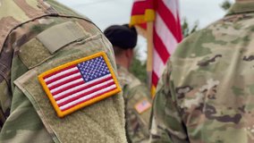 US soldiers. US army. USA patch flag on the US military uniform. Soldiers on the parade ground from the back. Veterans Day. Memorial Day. - Powered by Shutterstock - Get 15% off with code: PIKWIZARD15