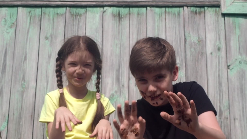Children smeared in the chocolate