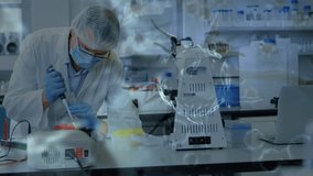 Animation of coronavirus cells over people in face masks in laboratory. global covid 19 pandemic, medicine and healthcare services concept digitally generated video. - Powered by Shutterstock - Get 15% off with code: PIKWIZARD15