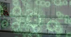 Animation of covid 19 cells over doctors in hospital. global covid 19 pandemic, medicine and healthcare services concept digitally generated video.
