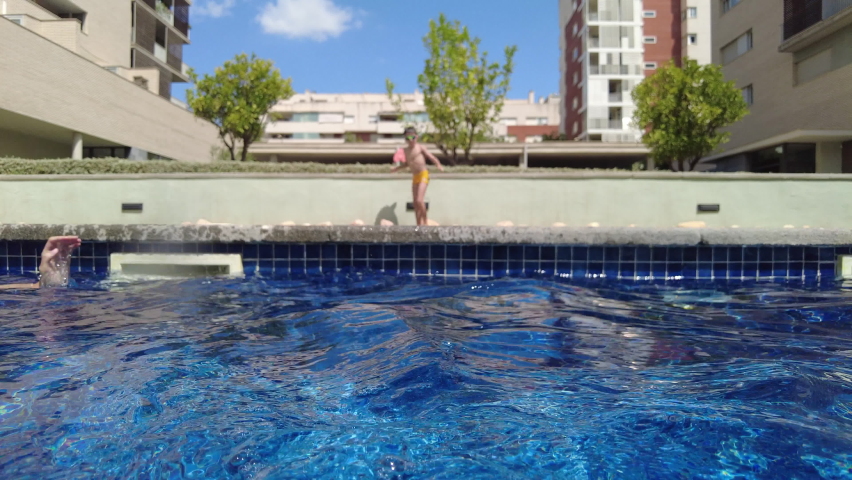 Child Jumping Into Pool in slow motion
