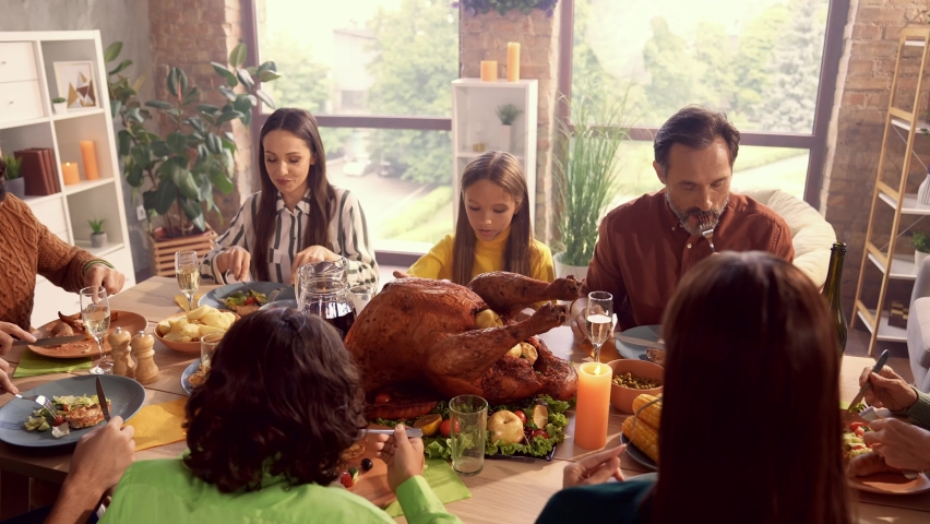 Nice people family gathering sit table eat dinner