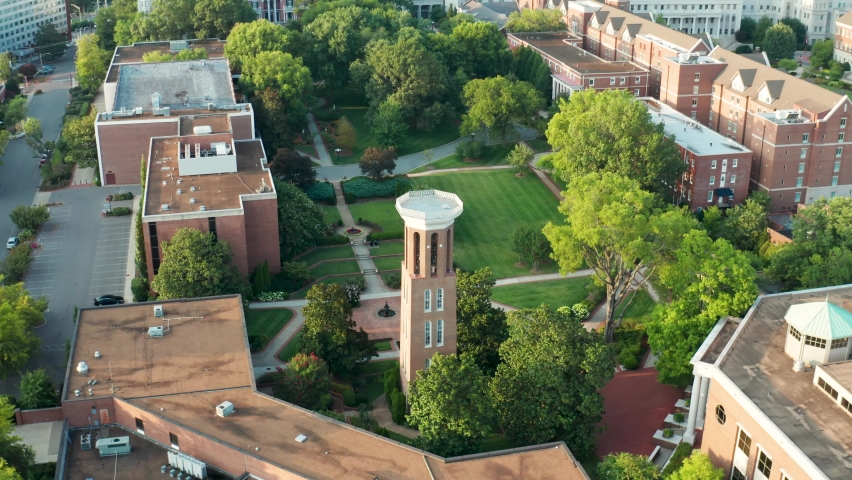 Belmont University college campus grounds. Bell tower, mansion, tilt up to reveal Nashville skyline. Aerial drone shot. Royalty-Free Stock Footage #1078282052