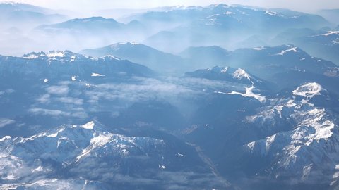 Aerial view above the mountain pyrenes range in 4k