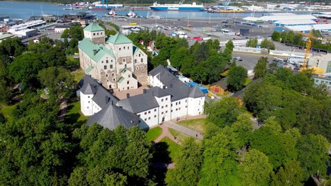 Turku, Finland - August 6, 2021: Aerial circle view on Turku Castle in Finland.