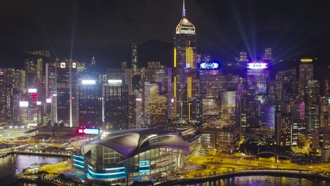 Aug 2021: Hong Kong ,China ,Asia: Drone aerial view of Hong Kong skyline with light show at Victoria Harbour