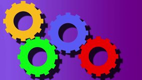 An animation video of coloured gears with shadows, turning on a graded blue to purple background.