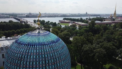 Flight on a copter over the domes of the Cathedral Mosque in St. Petersburg. 