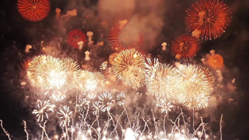 4K. loop seamless of real fireworks background. abstract blur of real golden shining fireworks with bokeh lights in the night sky. glowing fireworks show. New year's eve fireworks celebration Royalty-Free Stock Footage #1078299992