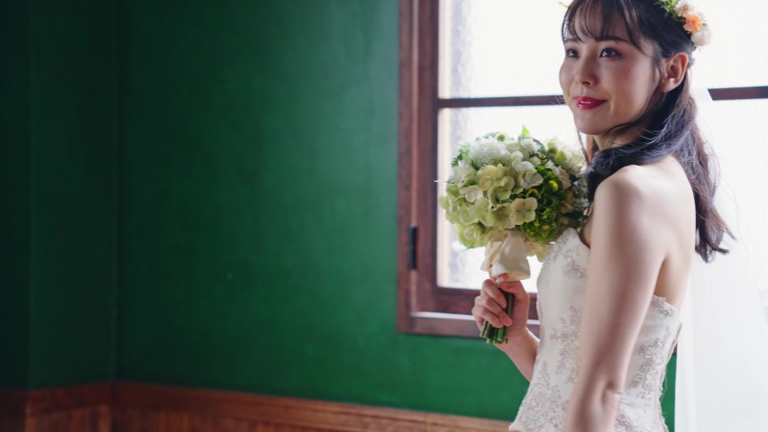 Bridal concept of a young asian woman. Wedding photo.