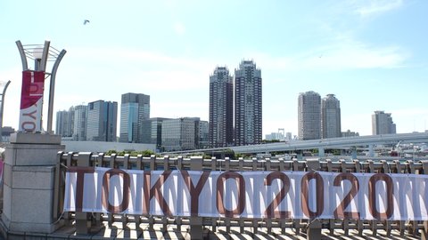 TOKYO, JAPAN - AUGUST 2021 : View of the Olympic logo sign or banner at the street (Tokyo 2020 Summer Olympic Games) at Odaiba area.