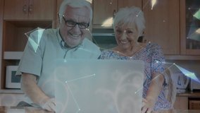 Animation of networks of connections over senior couple using laptop. global connections, shopping and digital interface concept digitally generated video. - Powered by Shutterstock - Get 15% off with code: PIKWIZARD15