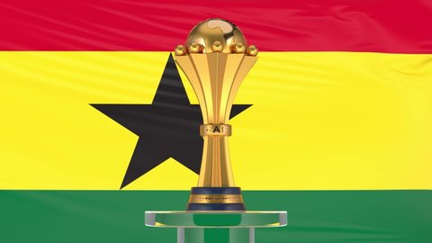 Accra, Greater Accra, Ghana August, 29th 2021: 3d African cup of nations model and Ghana flag
