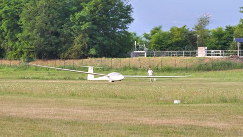Thiene, Italy JULY, 8, 2021 Two-seater glider that takes off by towing a propeller plane. Schempp-Hirth Duo Discus
