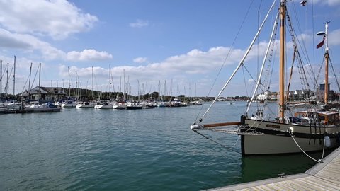 Littlehampton, West Sussex, UK, August 25, 2021.  Restored Fishing Lugger named Our Lizzie Sailing boat moored on a jetty on the River Arun in Littlehampton, she took part in the Dunkirk evacuation.