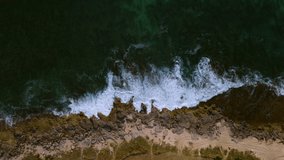 Crashing waves on Hawaiian coast. With a drone