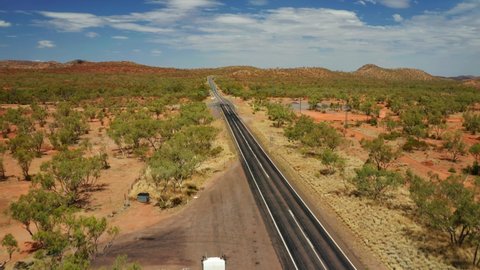 Endless Asphalt Road Through Outback, Northern Territory In Australia. - Aerial Drone