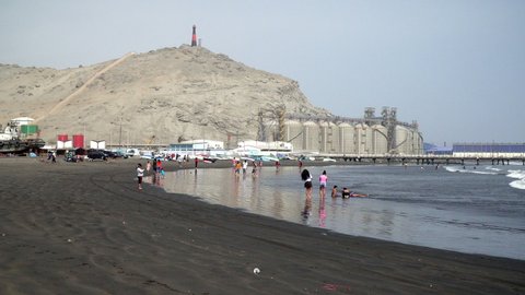 Trujillo , La Libertad , Peru - 07 26 2021: Landscape of bathers enjoying their time at Playa Salverry beach, Trujillo, La Libertad, Peru