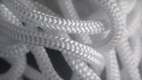White Nylon Rope extreme close up with a sliding camera move professional stock footage