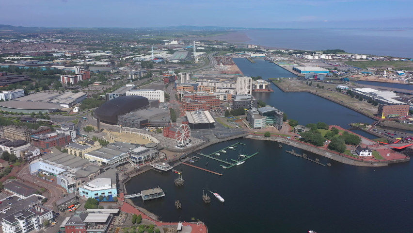 Aerial over Cardiff Bay, Pierhead building and Welsh Assembley (Seneddd) Wales, United Kingdom Royalty-Free Stock Footage #1078364210
