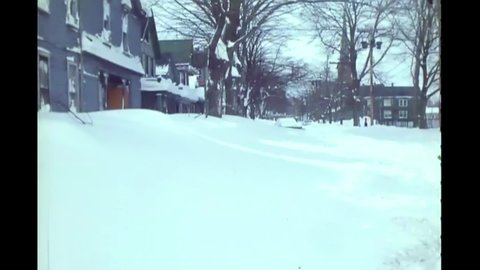 CIRCA 1977 - A neighborhood in Buffalo, New York is blanketed with snow after a blizzard.