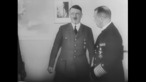 CIRCA 1944 - The Nazis use V-1 jets and V-2 rockets against the allies, and Hitler confers with his military officers, refusing their advice.