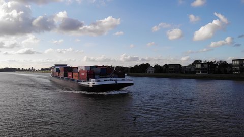 Alblasserdam , Netherlands - 07 31 2021: Forward Bow Of Missouri Inland Container Vessel Navigating River Noord. Aerial 