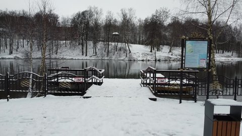 Sergiev Posad, Russia - 21 November 2020: Winter pier in the park "Skitskie prudy"