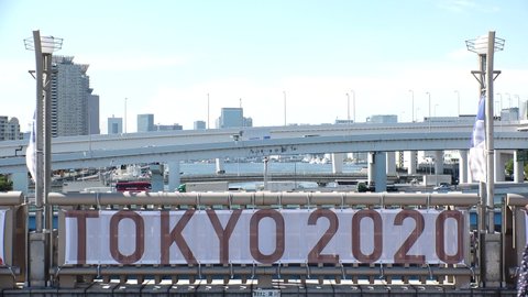 TOKYO, JAPAN - AUGUST 2021 : View of the Olympic logo sign or banner at the street (Tokyo 2020 Summer Olympic Games) at Odaiba area.
