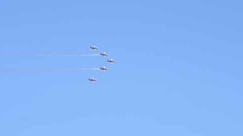 Gdynia , Poland - 08 22 2021: Five planes performing stunts over Gdynia airfield during 2021 airshow. 