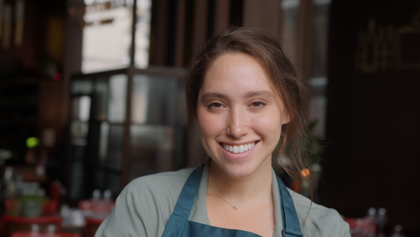 Slow motion portrait of restaurant owner smiling | Shutterstock HD Video #1078421237